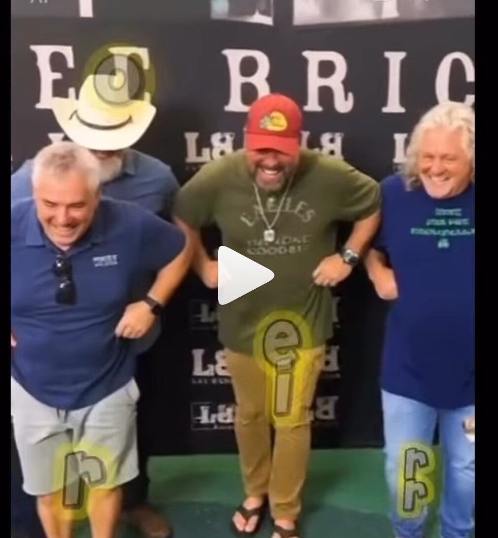 Gnarley Charley laughing with guests at a live event